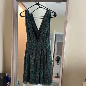PERFECT FOR HOLIDAYS 
Lulu's Green Plunge Neck Fit and Flare Mini Dress